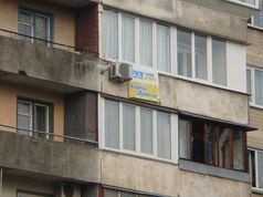 Кияни заробляють на балконах